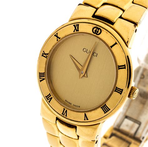 all gold Gucci watch